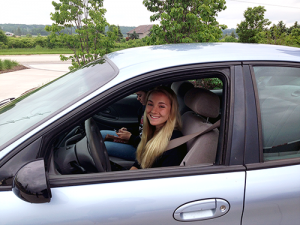 Girl happy to be back in car after being locked out of her car in Fond du Lac, Wisconsin.